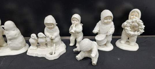 Bundle of 10 Assorted Dept. 56 Snow Baby Ceramic Figurines image number 2