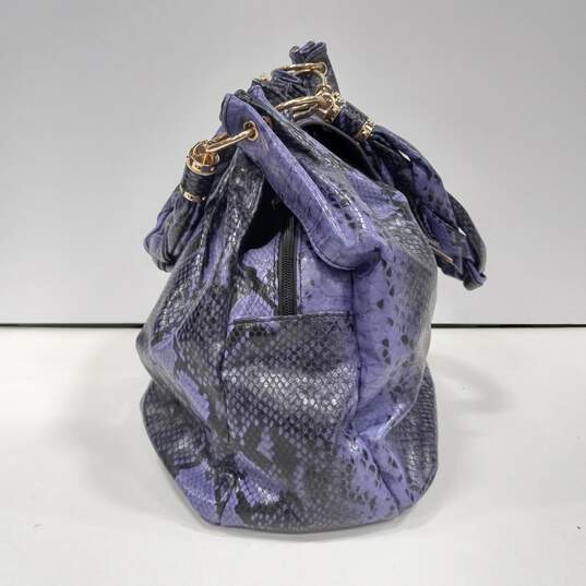 Charming Charlie Purple And Black Faux Snakeskin With Striped Lining Handbag image number 3