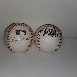 Pair of Signed Baseballs by Players #45 and 52