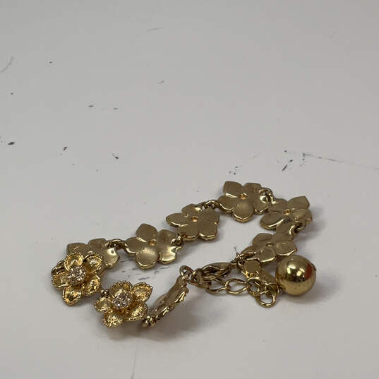 Designer Kate Spade Gold-Tone Rhinestones Twisted Flower Chain Bracelet image number 3