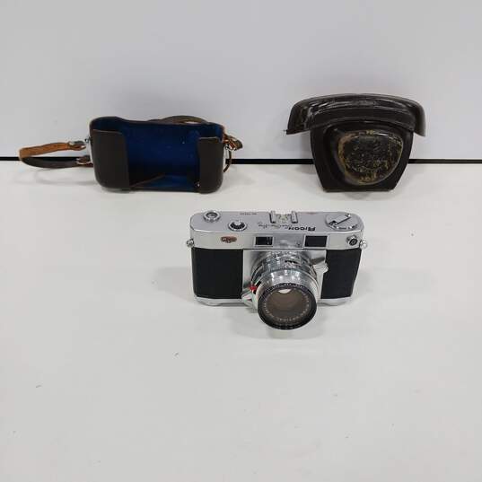 Vintage Ricoh 519 Film Camera w/ Leather Brown Case image number 1