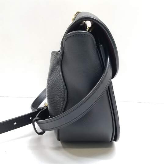 Buy the Coach Black Smooth Pebble & Suede Mixed Leather Kat Saddle Bag ...