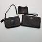 Lot of Three Small Brown/Black Coach Wallets/Wristlets image number 1