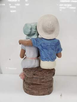Nadal ceramic Sculpture of Boy & girl and Dog alternative image