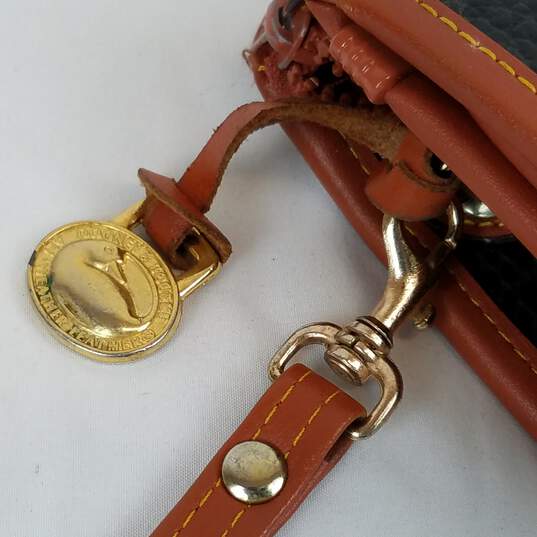 Dooney & Bourke  Vintage Dooney & Bourke Woman's Wristlet Billfold  Color: Brown/Tan image number 3