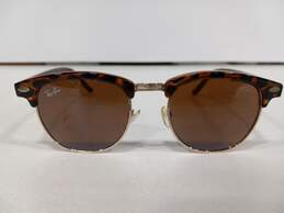 Two Pairs of Sunglasses alternative image