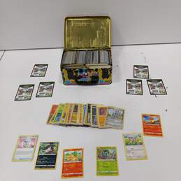 Bundle of Assorted Nintendo Pokemon Trading Cards In Tin Case
