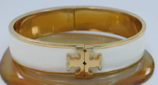 Tory Burch Gold Tone Ivory Enamel Cuff Bracelet 54.0g image number 4