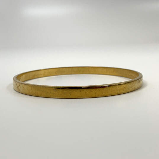 Designer Kate Spade Gold-Tone Round Fashionable Bangle Bracelet image number 2