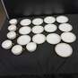 Bundle of 13 Saucers and 6 Cups that are White w/Gold Tone Trim image number 1