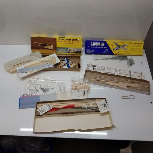 Mixed Lot Wood & Paper Airplane Model Kits - Parts/Repair image number 1