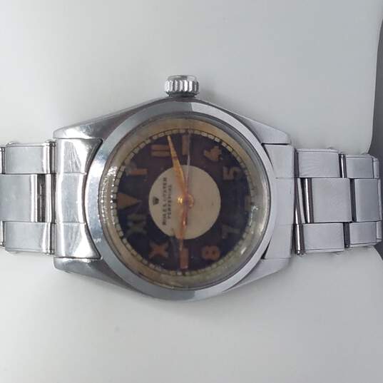 Buy the Rolex Oyster Perpetual Stainless Steel 1161 Caliber Dial 26 Jewels 6549 Automatic Watch w/COA | GoodwillFinds
