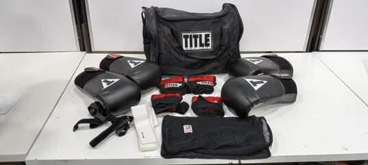 Title Boxing Bag w/2 Pairs of Boxing Gloves, 2 Pairs of Inner Gloves, Mesh Bags for the Inner Gloves, and 2 Straps image number 1