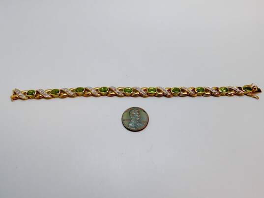 14K Yellow Gold Oval Peridot 0.10 CTTW Diamond Crossover Tennis Bracelet 11.4g image number 3