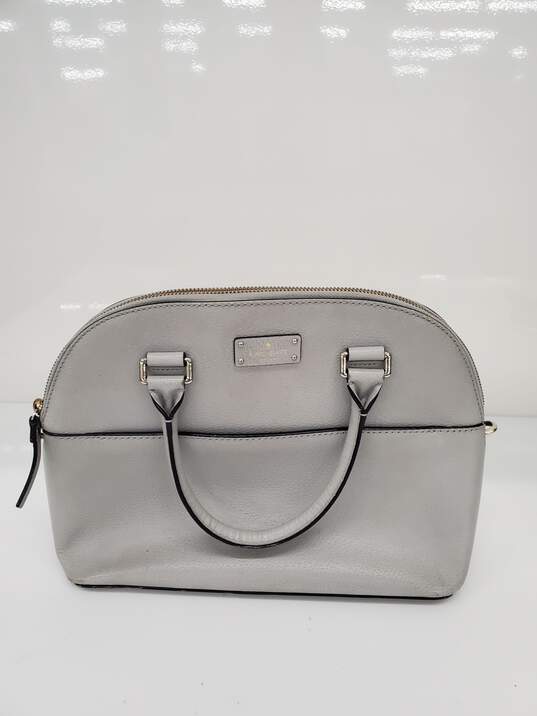 Kate Spade Leather handbag/purse Women Used image number 1