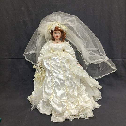Vintage Porcelain Wedding Themed Doll w/Dress image number 1