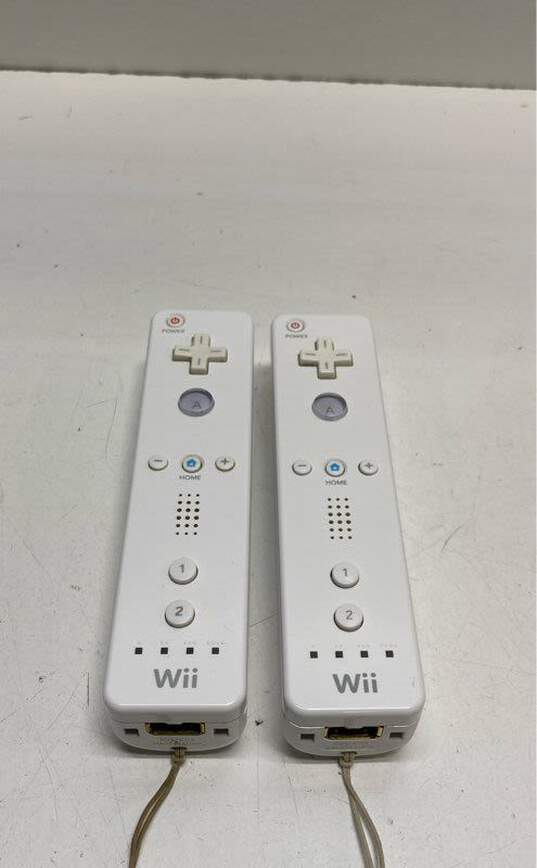 Set Of 2 Nintendo Wii Remotes- White image number 1