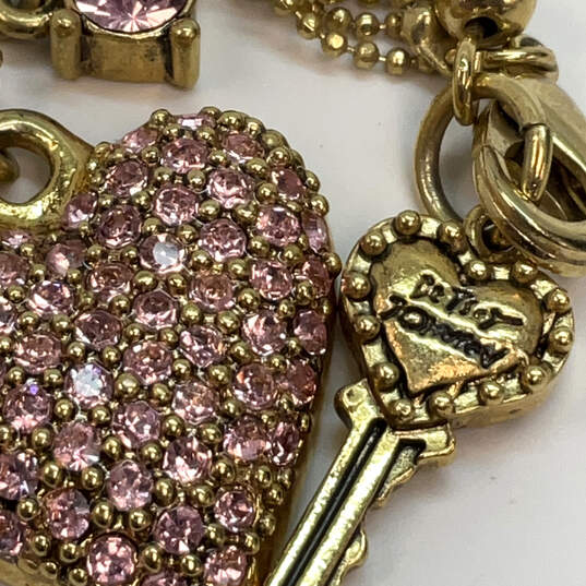 Designer Betsey Johnson Gold-Tone Pink Rhinestone Heart Pendant Necklace image number 4