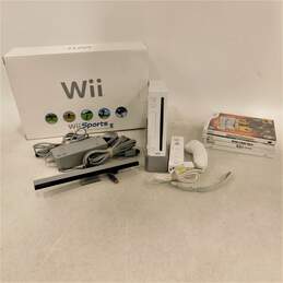 Nintendo Wii in original box w/4 Games and the Beetles Rock band