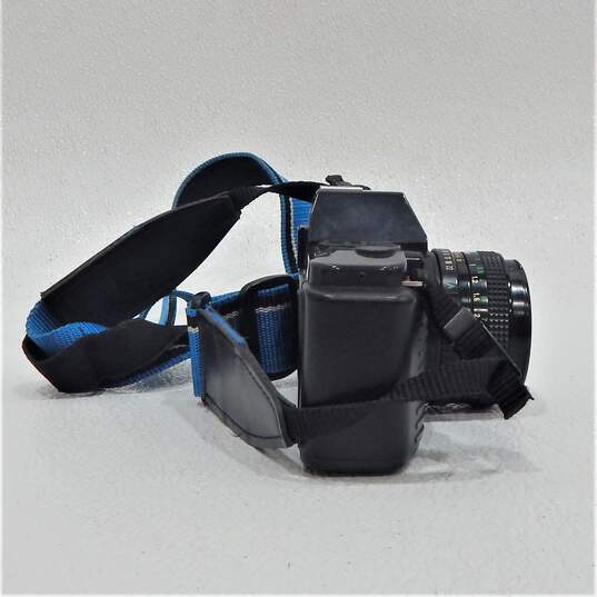 Canon T50 50mm SLR Film Camera w/ Gemini Auto 2x Tele Converter Lens, Bag, Manuals and Flash image number 4