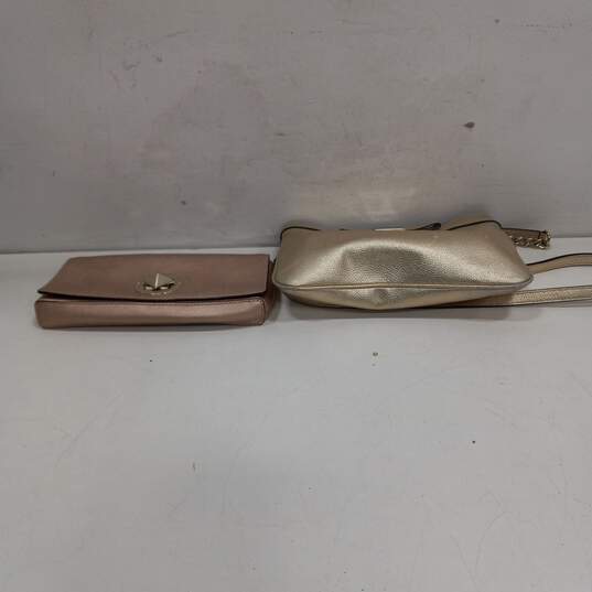 Pair of Rose Gold Leather Hand Bags image number 4