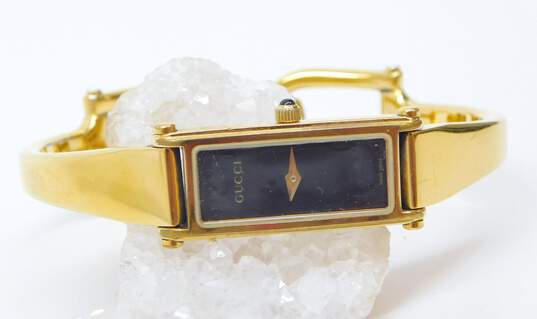 Gucci 1500 L Gold Tone Black Dial Swiss Quartz Bracelet Watch 27.9g image number 4