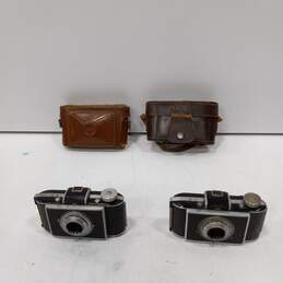 Bundle of Two Vintage Kodak Film Cameras w/ Leather Covers