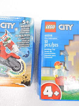 City Cop Vs. Robber Activity Book + Factory Sealed Sets 60332: Stunt Bike & 60318: Fire Helicopter alternative image