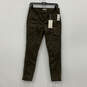 NWT Womens Green Denim Animal Print Front Pocket Skinny Jeans Size 28 image number 1