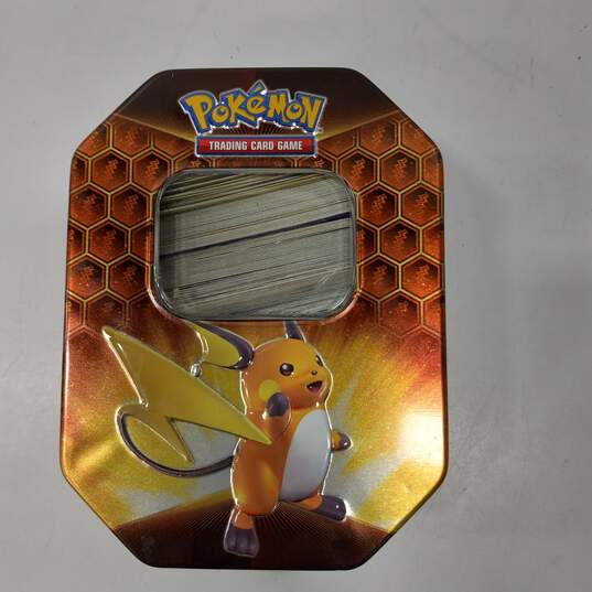 2lb Lot of Assorted Nintendo Pokemon Trading Card Singles in Collector Tin image number 4