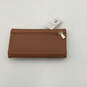NWT Womens ZG850066 Brown Leather Inner Card Slots Snap Tri-Fold Wallet image number 2