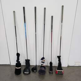 Bundle Of Assorted Golf Clubs W/ Covers