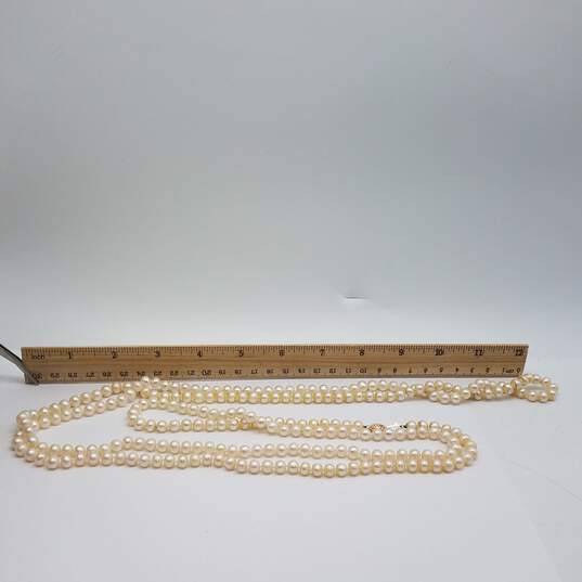 IPS 14k Gold Knotted 6.5mm Fw Pearl 64 Inch Necklace 97.0g image number 8