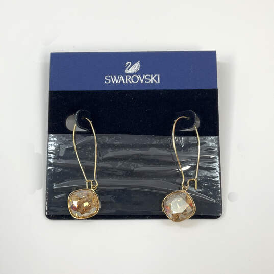 Designer Swarovski Gold-Tone Crystal Cushion Cut Stone Oval Dangle Earrings image number 1