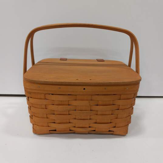 Vintage Longaberger Large Hand Woven Basket with Lid image number 1