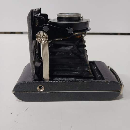 Vintage Black Compact Kodak Hand Held Camera image number 5