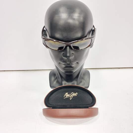 Maui Jim Sunglasses In Brown Leather Case image number 1