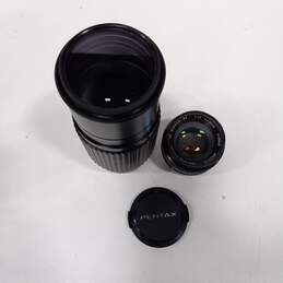 Pair Of Camera Lenses Minolta Rokkor 55mm & Pentax SMC Pentax-A ZOOM 70-210mm alternative image