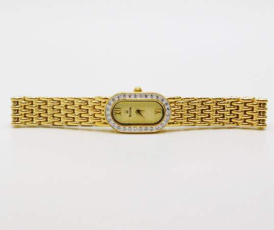 Women's Bulova 0.25 CTTW Diamond Bezel Gold Tone Watch image number 1