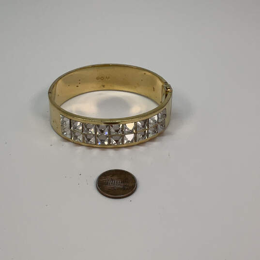 Designer Swarovski Gold-Tone Clear Crystal Stone Hinged Bangle Bracelet image number 3