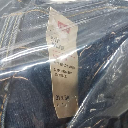 Levis men's 511 slim stretch dark wash jeans 31 x 34 long image number 3