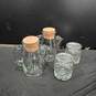Bundle of 4 Glass Containers With Lids/Corks image number 1