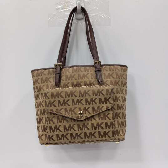 Women's Michael Kors Gold Monogram w/ Brown Trim Handbag image number 1