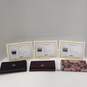 3pc Set of Authenticated Coach Women's Signature Canvas Zip Around Wallets image number 1