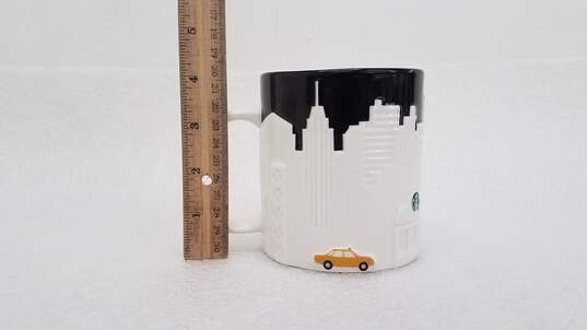 Starbucks New York City Relief Collection 16oz Mug Raised Skyline Taxi 2012 image number 3