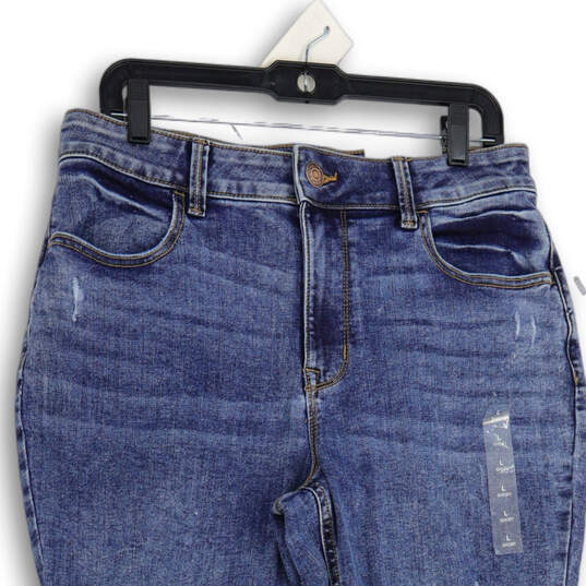 NWT Womens Blue Denim Medium Wash Distressed Jegging Jeans Size Large image number 3