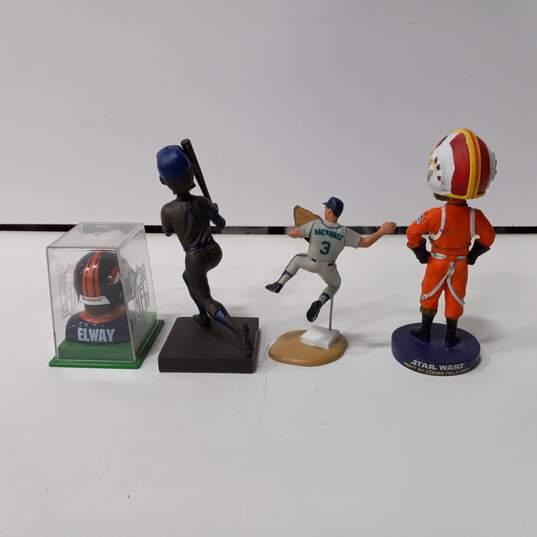 4pc. Bundle of Sports Figurines image number 2