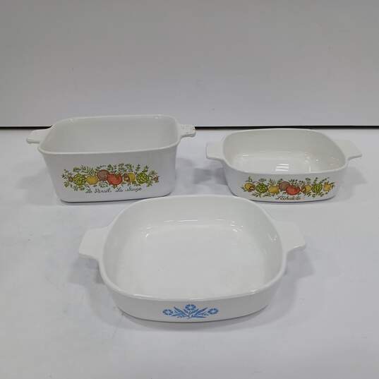 Bundle of 3 White w/ Floral Design Corning Ware Dishes image number 1