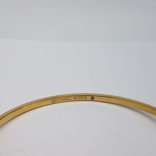 Michael Kors Gold Tone Crystal 5 1/2 Inch Cuff Bracelet 6.5g image number 9