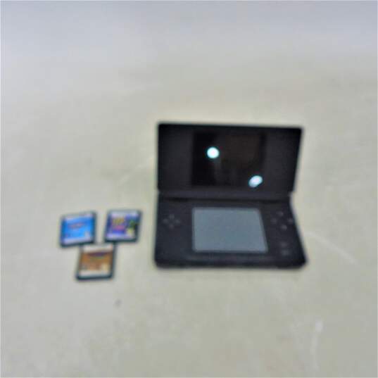 Nintendo DSI W/ Three Games Club Penguin image number 1